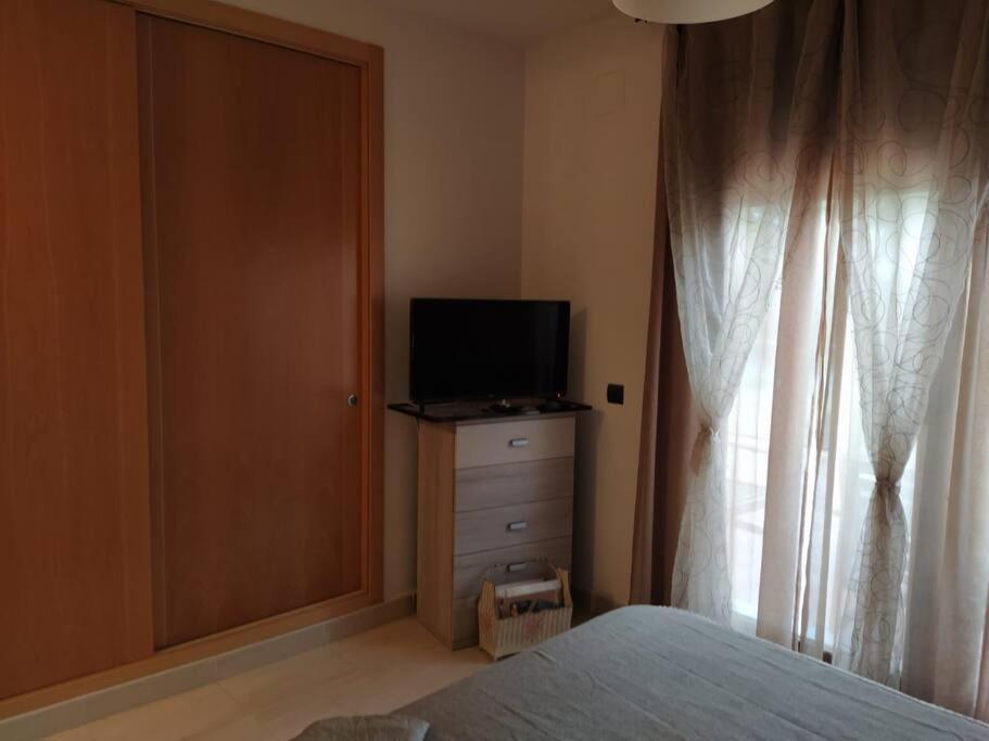 Bajo Puerta De Alcazaba Apartment Retamar  Bagian luar foto